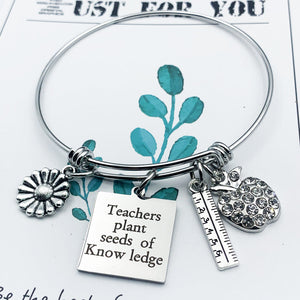 Teachers plant seeds of Know ledge Bracelet