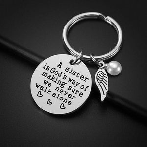 A Sister is God's Way of Making Sure We Never Walk Alone Key Chain