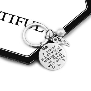 A Sister is God's Way of Making Sure We Never Walk Alone Key Chain